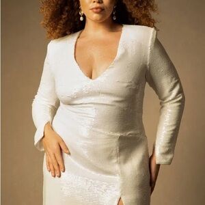 Long sleeve white sequin gown by Eloquii Bridal in size 14